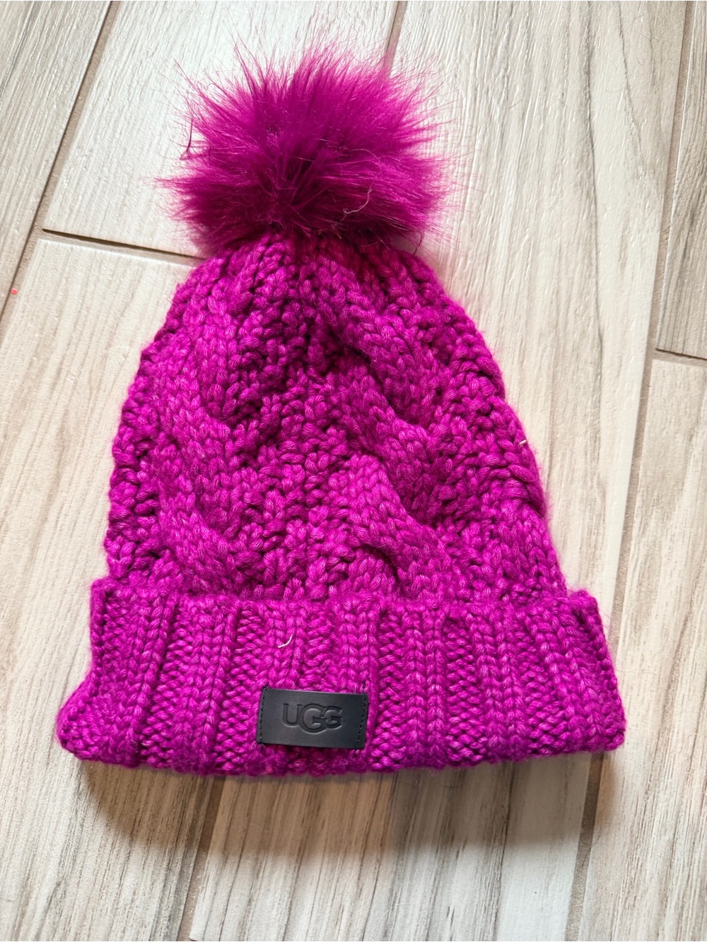 UGG women’s Magenta Knit Pom Beanie